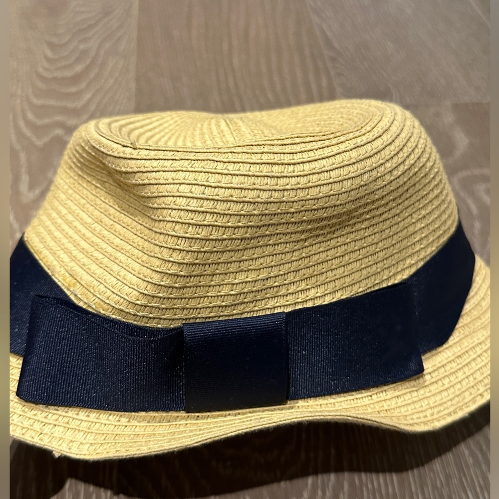 Stylish Tan Bucket Hat with Black Ribbon